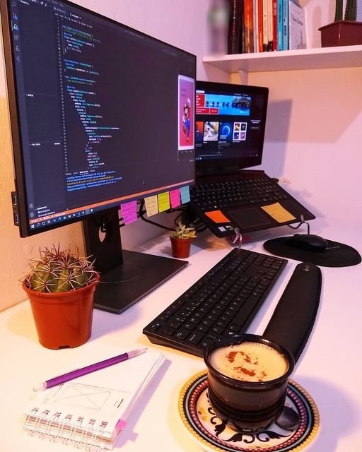 A workspace with a computer, keyboard, mouse, and coffee cup, designed to enhance user experience at Digitixel Marketing.
