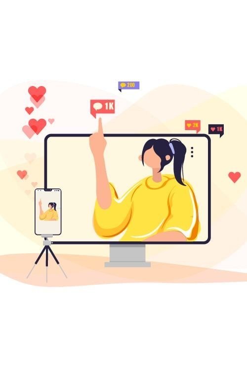 1. A woman engages with a computer, camera, and phone, symbolizing influencer partnerships at Digitixel Marketing.
